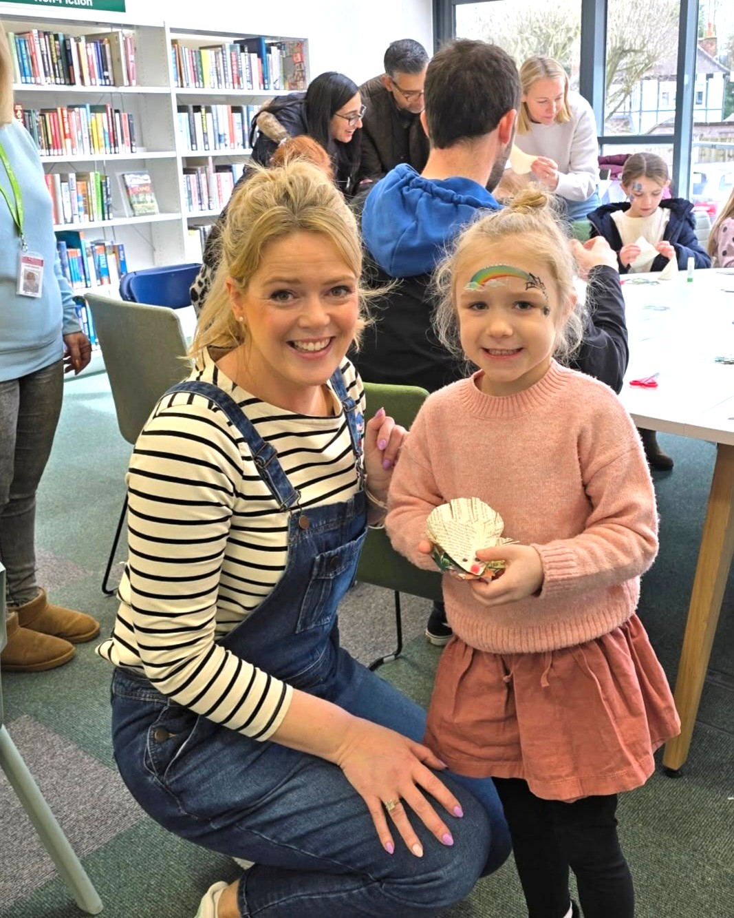 Becky and a young girl at a children's craft workshop at Shenfield Library
